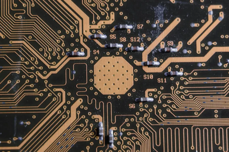 Small Holes, Big Consequences: The Engineering Reality of Via Stitching and Long-Term PCB Reliability